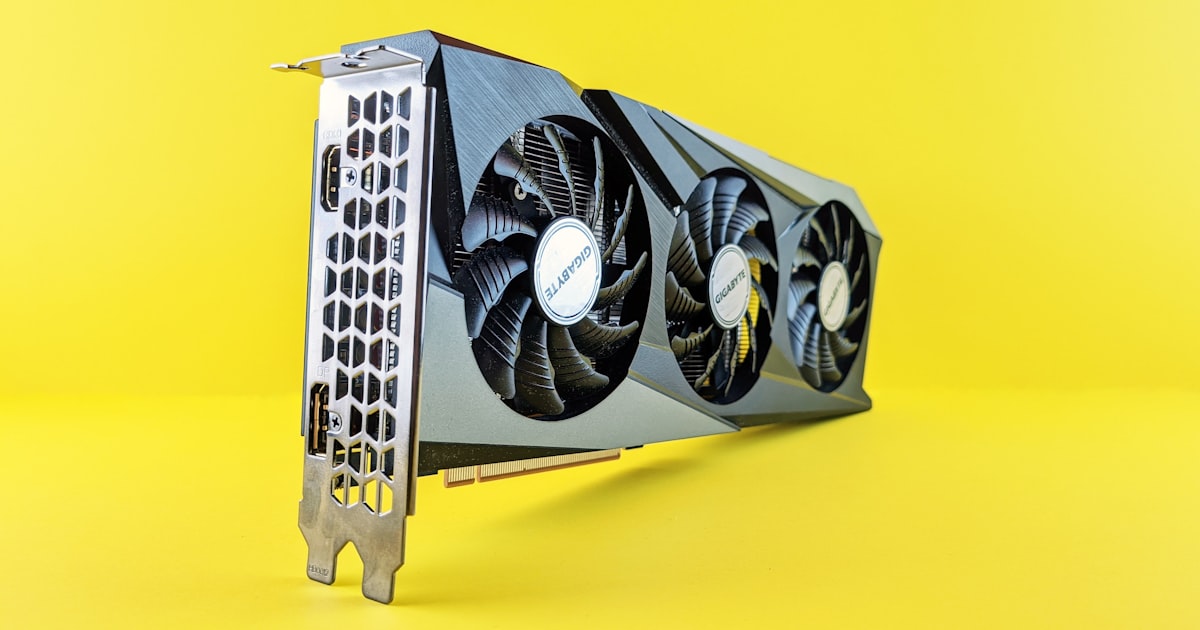 a close up of a computer fan on a yellow background