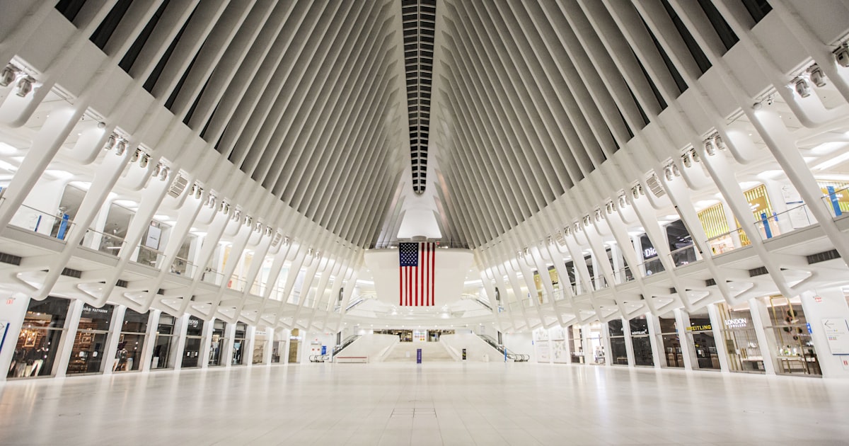 people walking inside white building