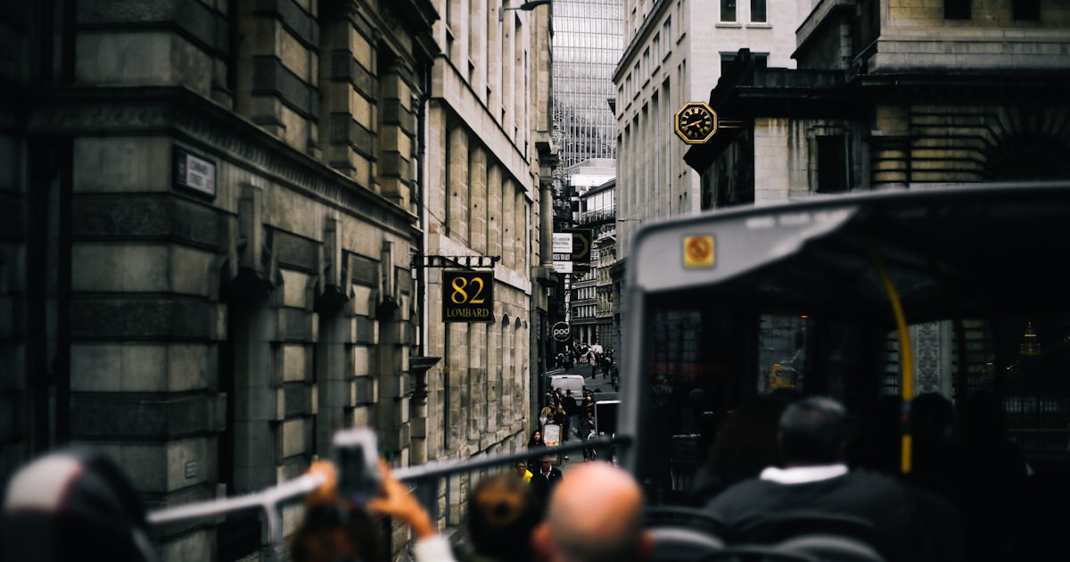 man on gray vehicloe