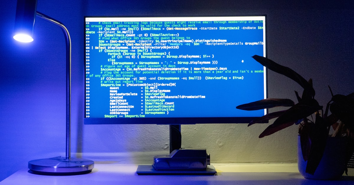 A computer screen displays lines of code.