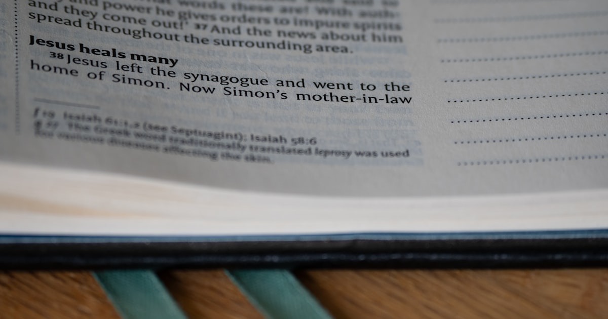A close up of an open book on a table