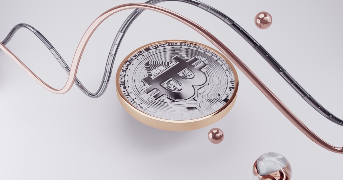 a compass with a bitcoin on top of it