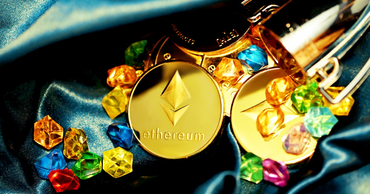 gold and silver round watch