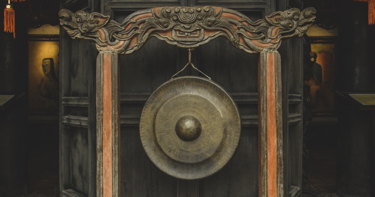 brown wooden framed round mirror