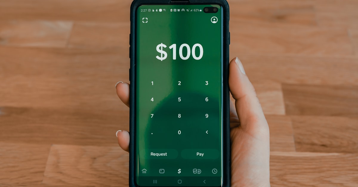 person holding black android smartphone