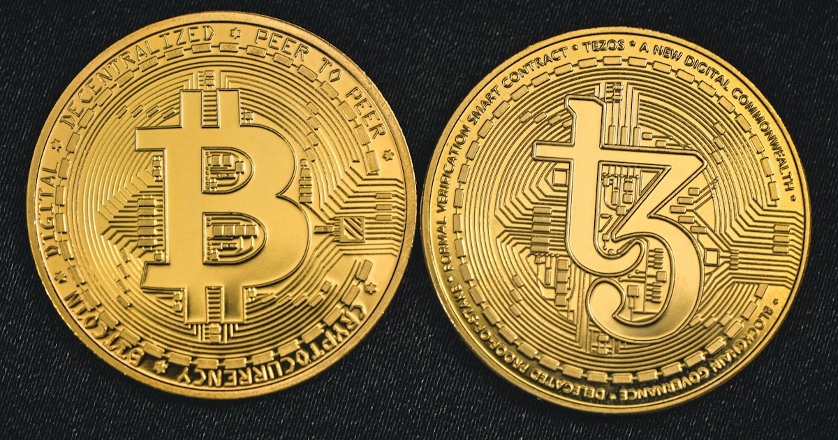 a bitcoin is shown on a black surface