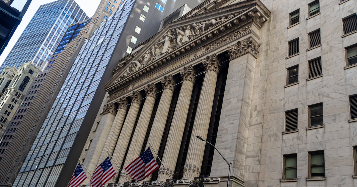 a building with flags on the outside