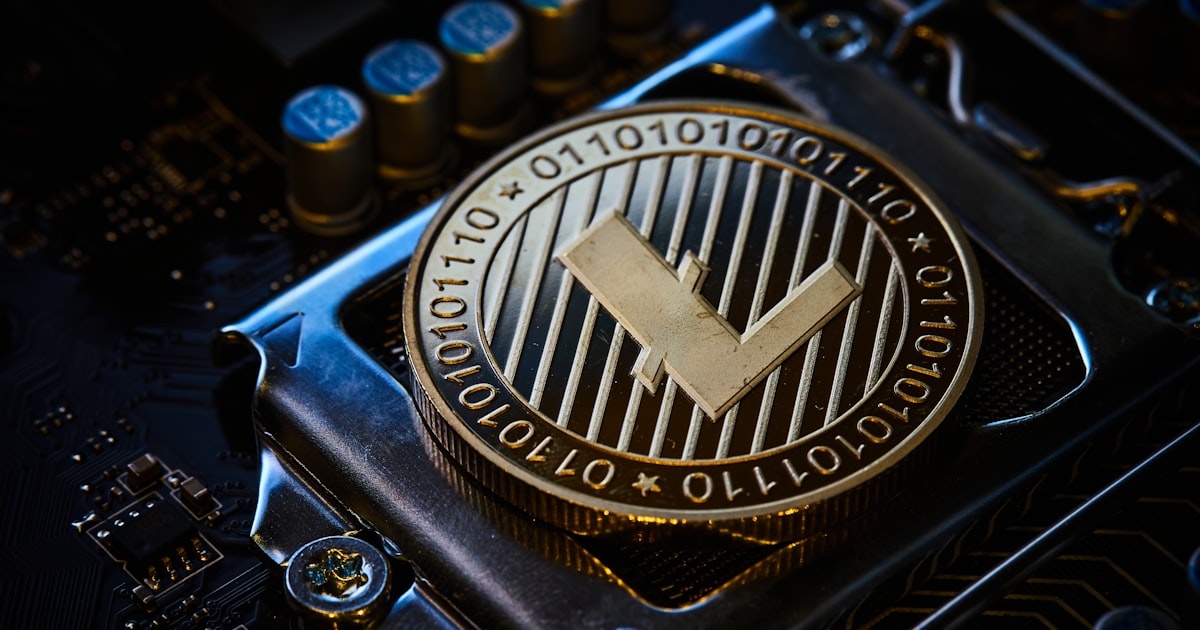 a close up of a computer chip with a tick symbol on it