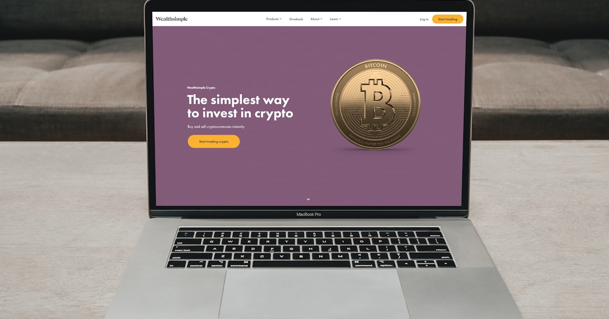 a laptop computer sitting on top of a table