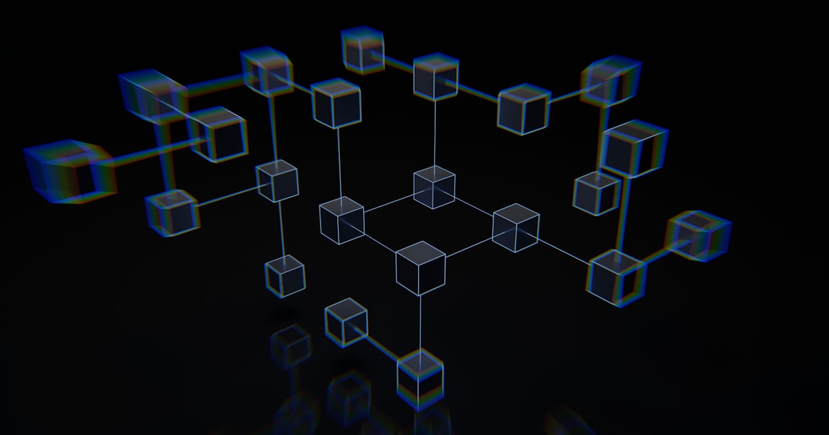 a group of cubes that are on a black surface