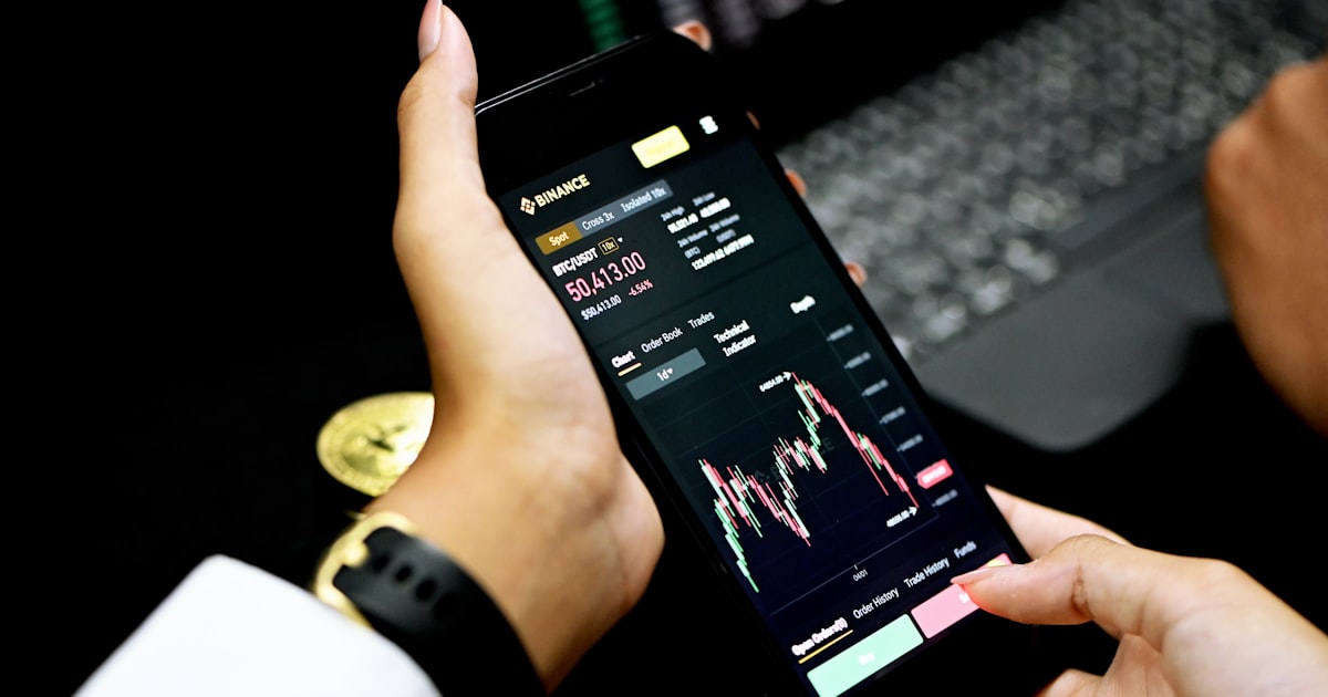 person holding black android smartphone