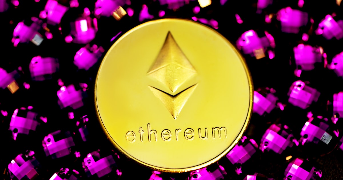 gold colored heart shaped pendant