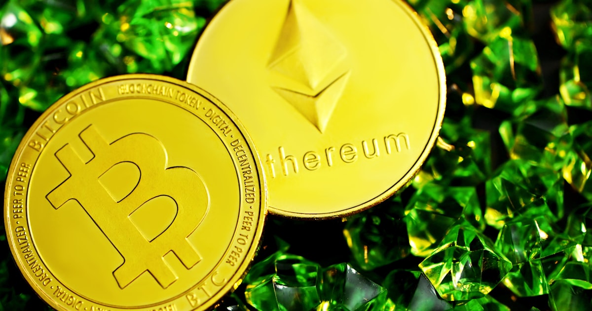 gold round coin on green plant
