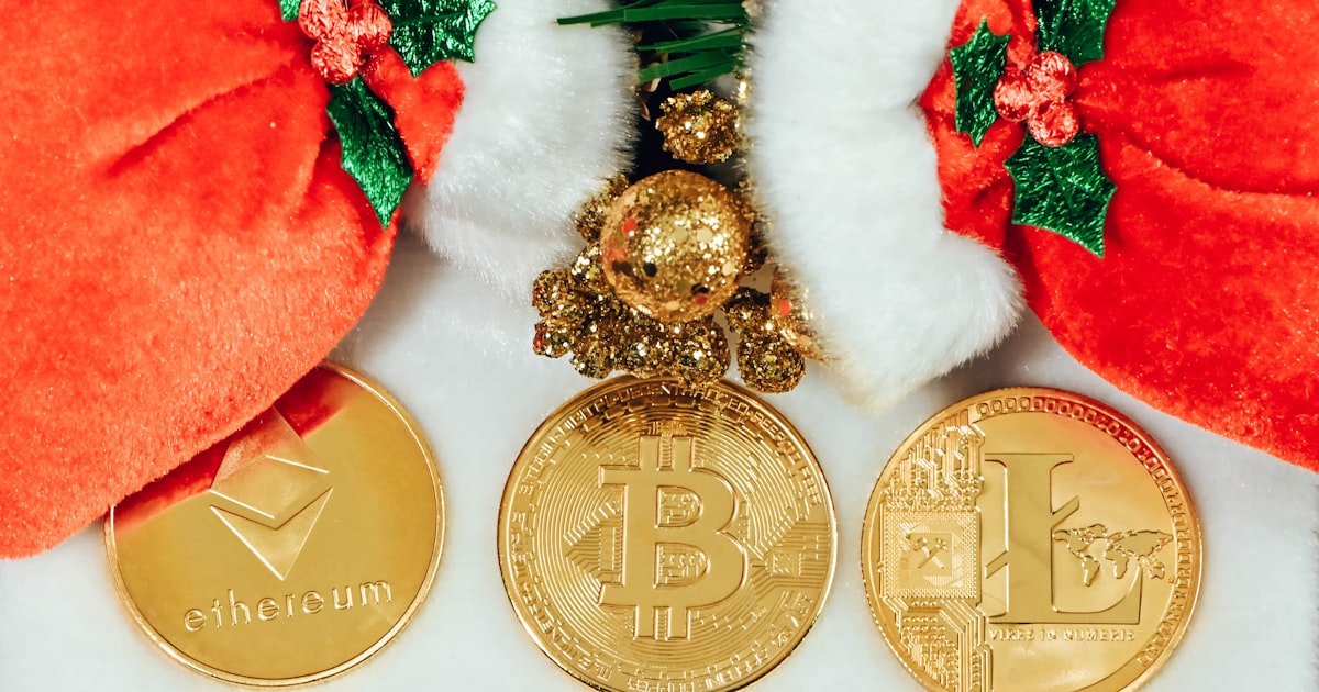 a bunch of gold coins sitting on top of a white table