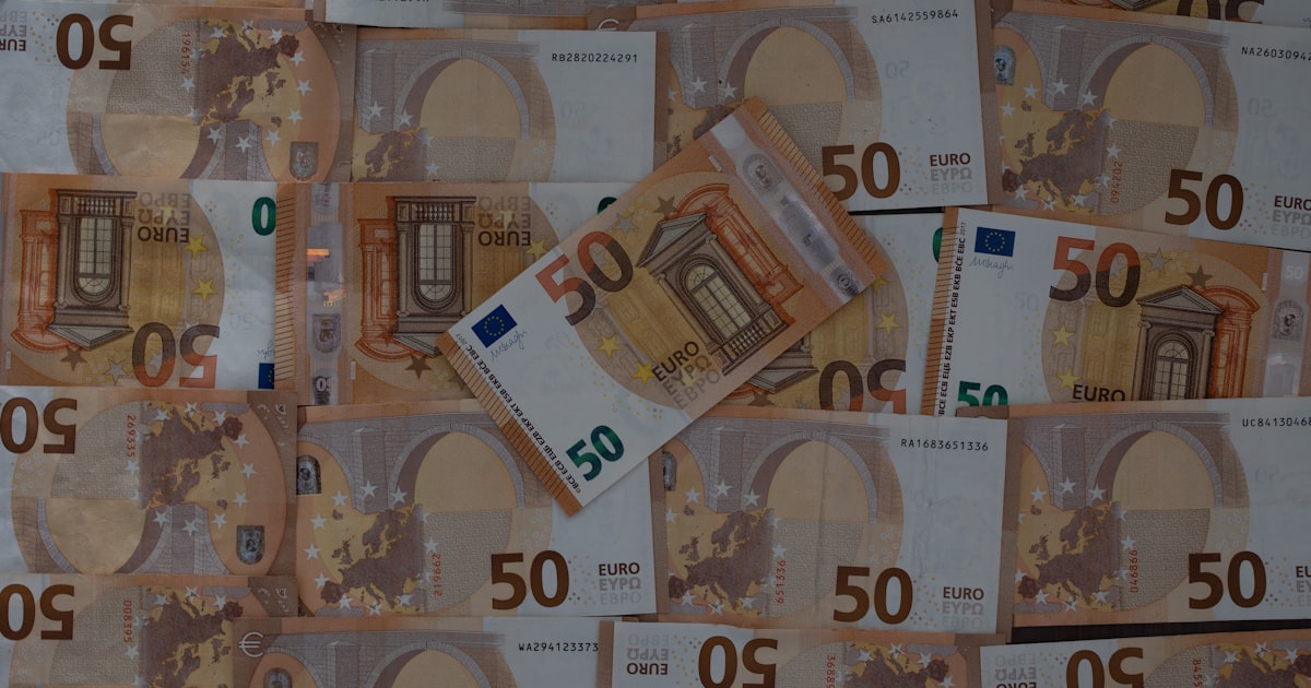 50 euro bill on clear glass table