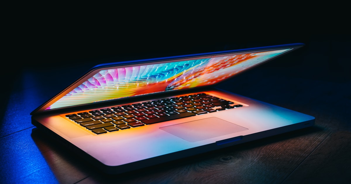 MacBook Pro turned-on in dark room