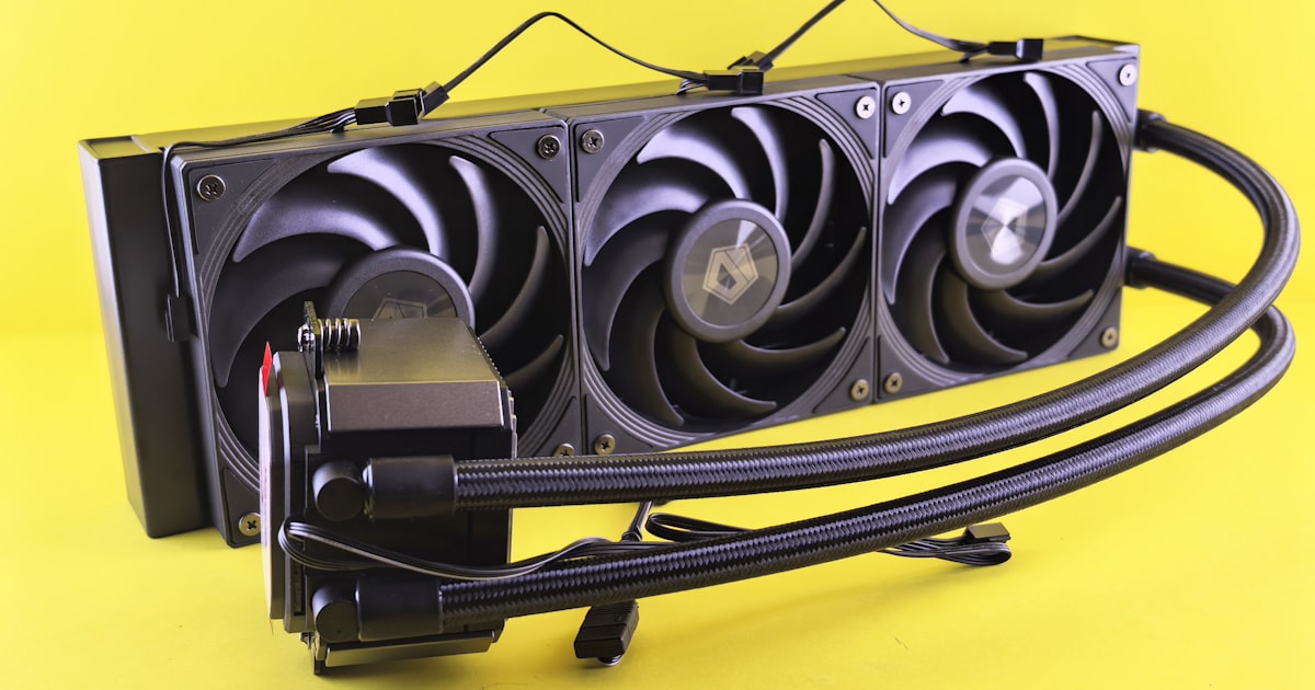 Computer graphics card cooler with three fans.
