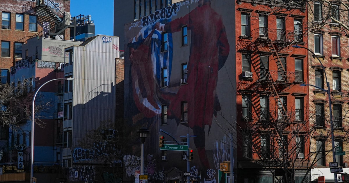 a large building with a mural on the side of it