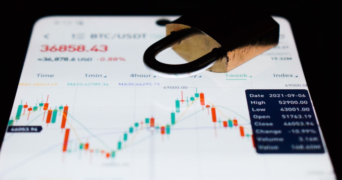 a close up of a business card with a stock chart on it