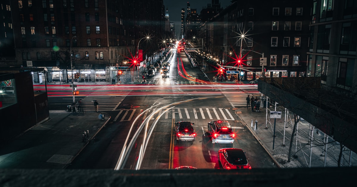 cars on road during night time