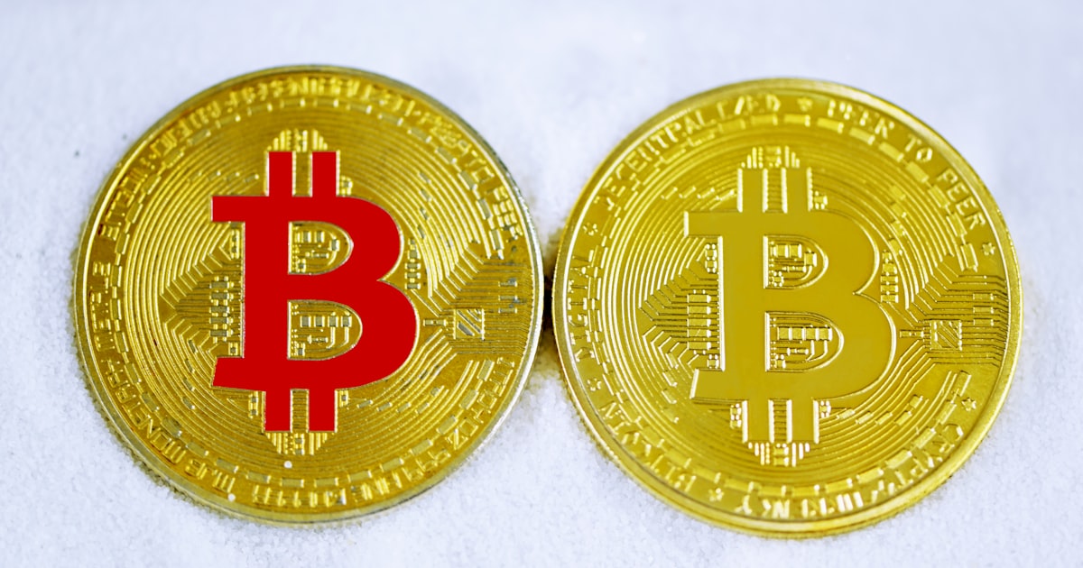 gold and red round coin