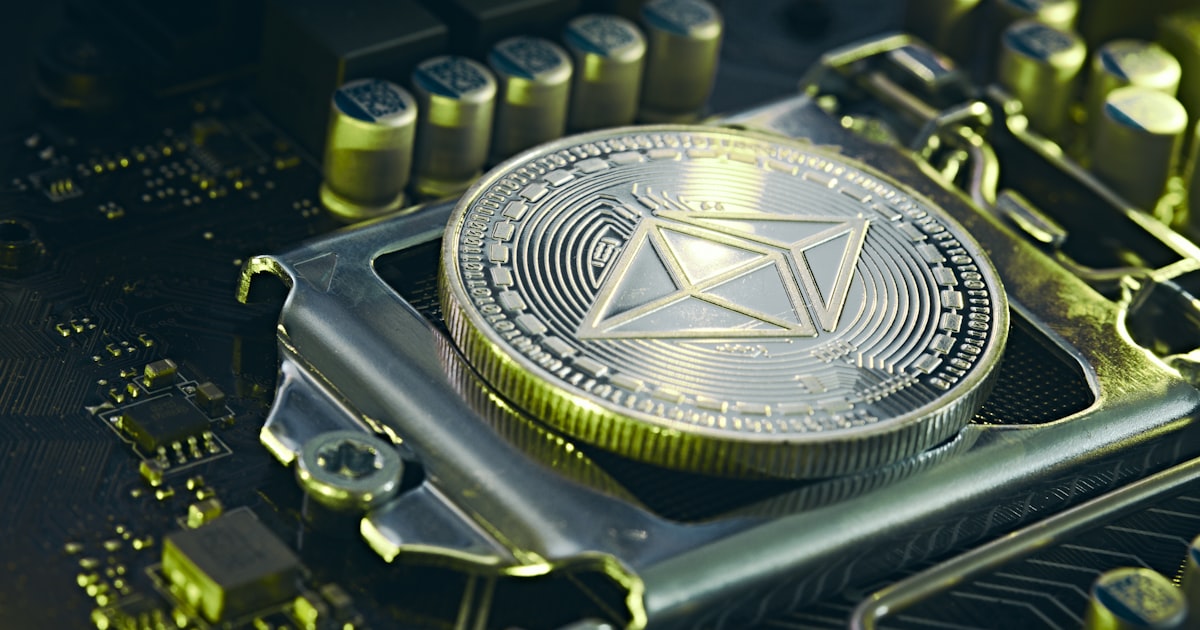 a bitcoin sitting on top of a computer motherboard