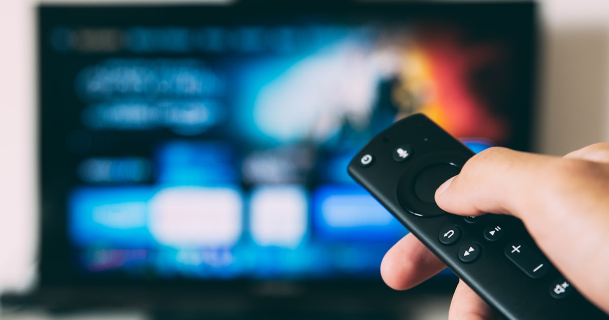 turned-on flat screen television