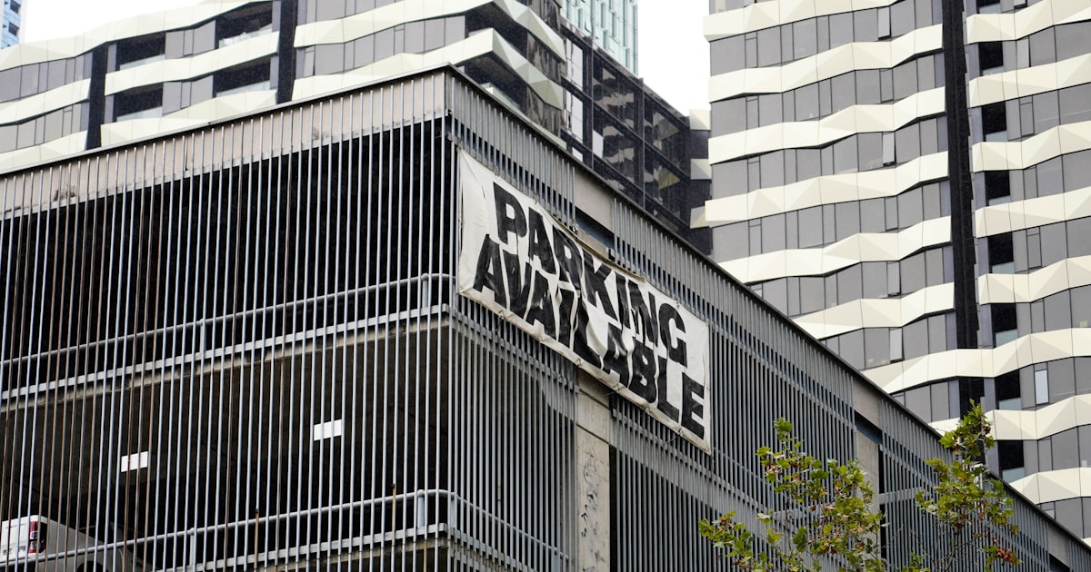 a street sign in front of a building