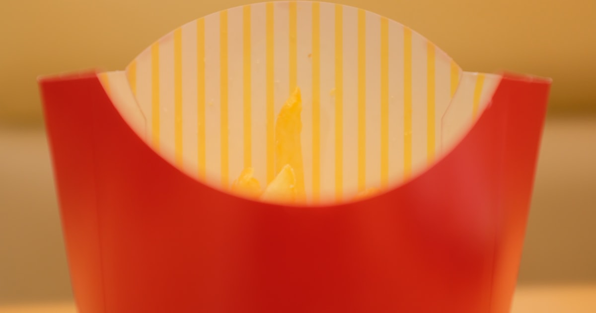 white and orange plastic container