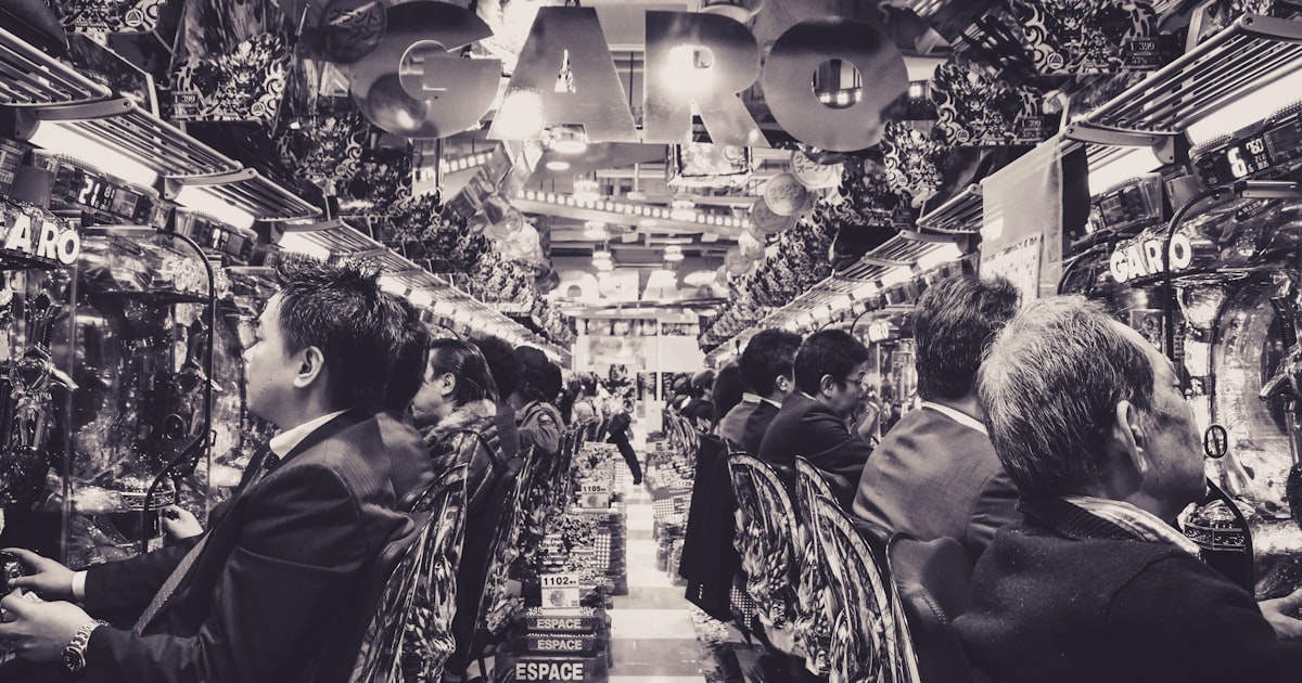 people playing on slot machines