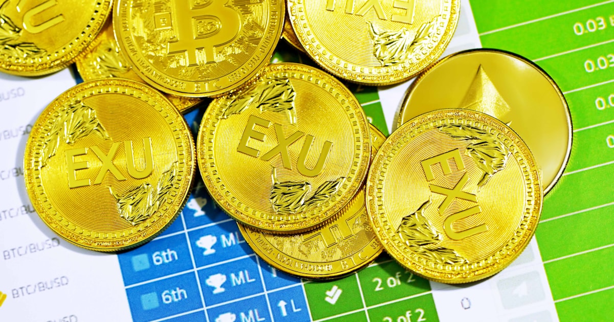 gold round coins on green and white checkered surface