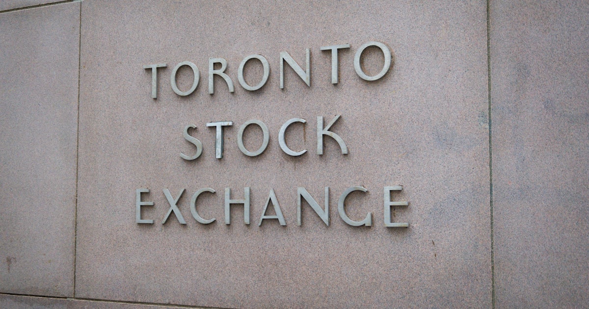 a sign on the side of a building that says toronto stock exchange