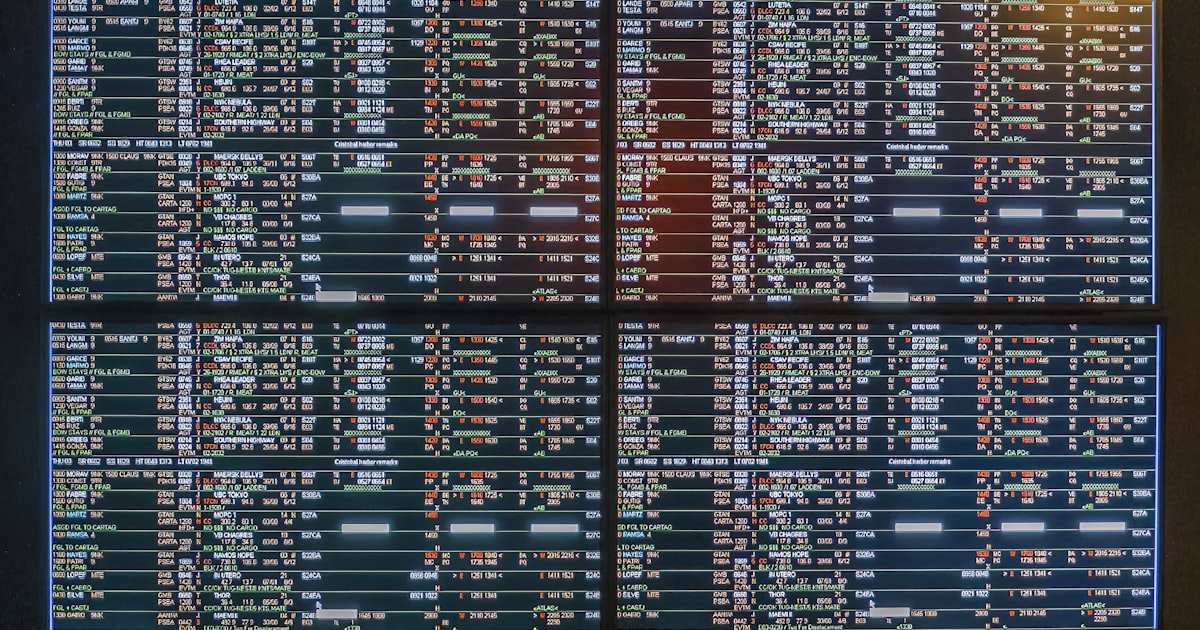 A large screen with a lot of numbers on it