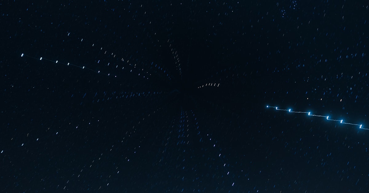 A very large star in the middle of a night sky