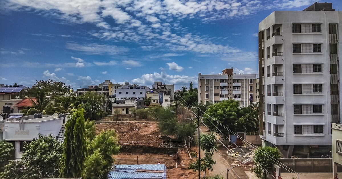 white concrete building under blue sky during daytime