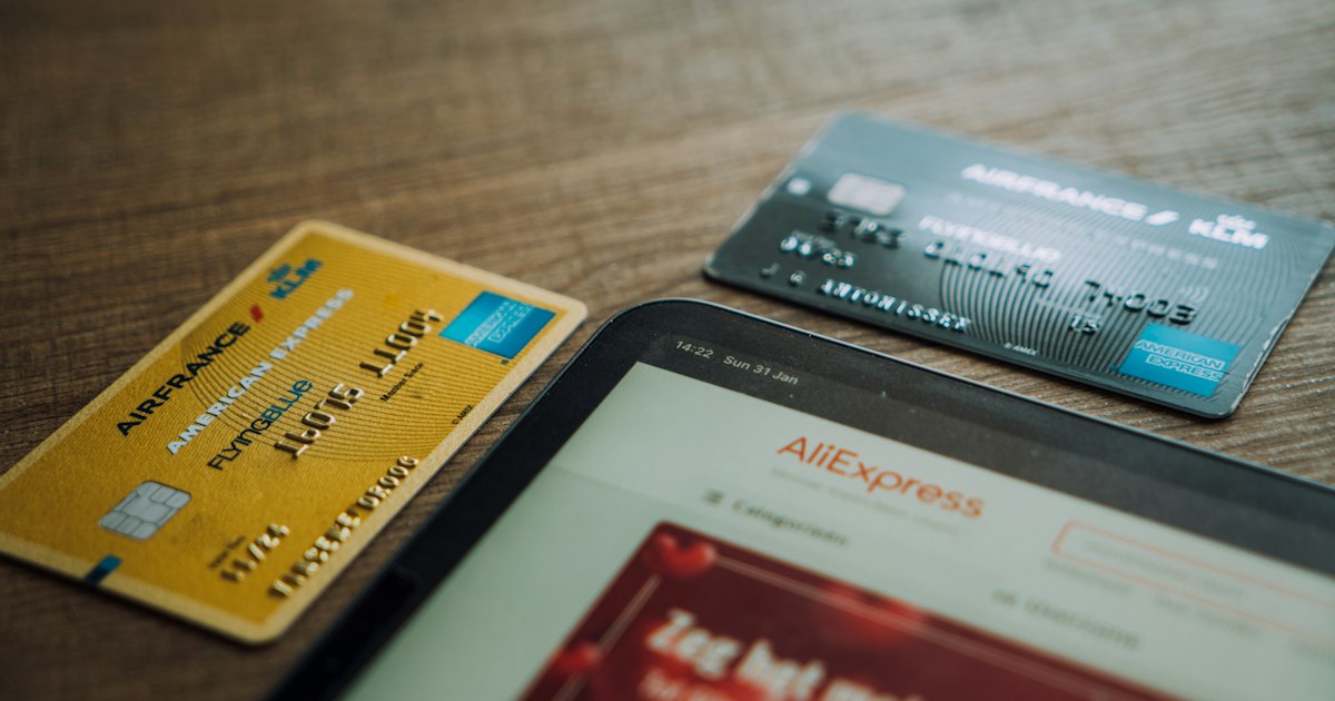 visa card on brown wooden table