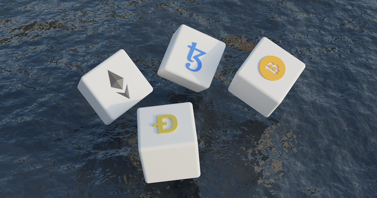 a group of dices floating on top of a body of water