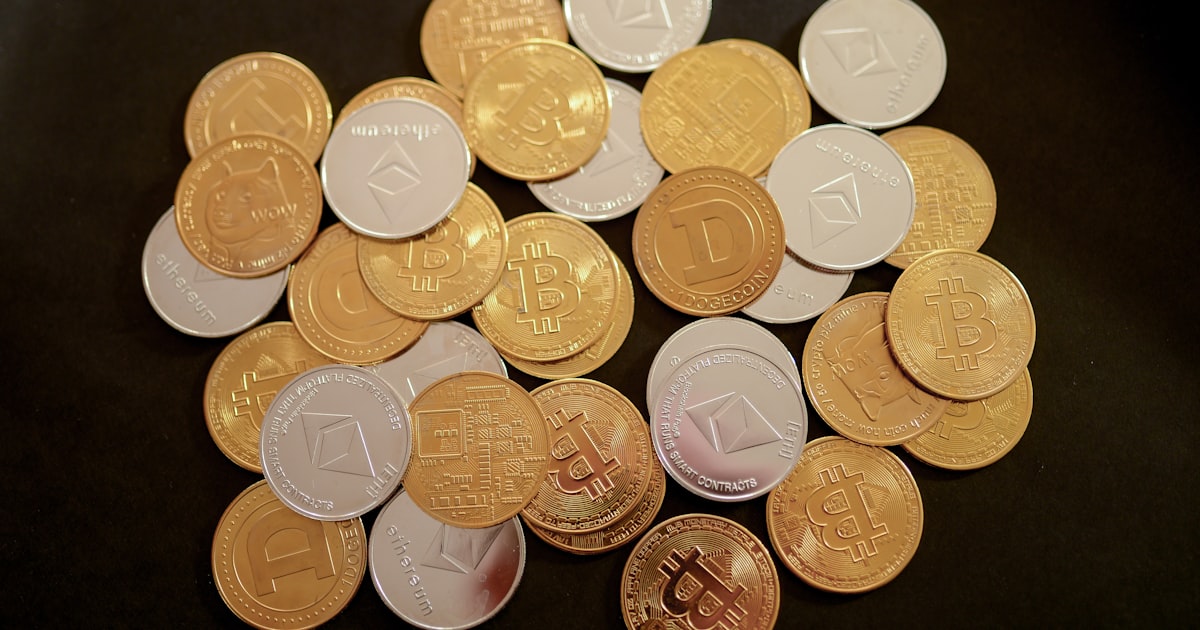 a pile of coins sitting on top of a table