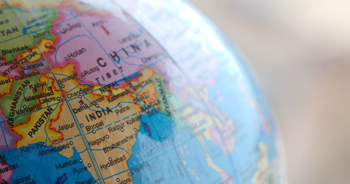 blue and brown world map globe