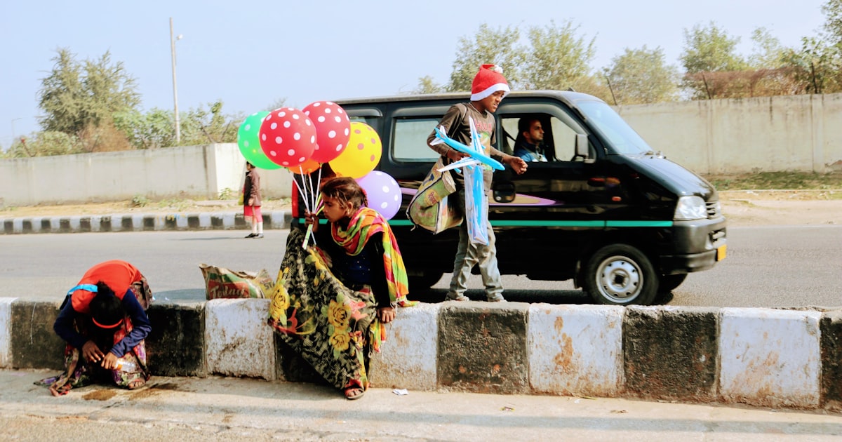 person holding balloons