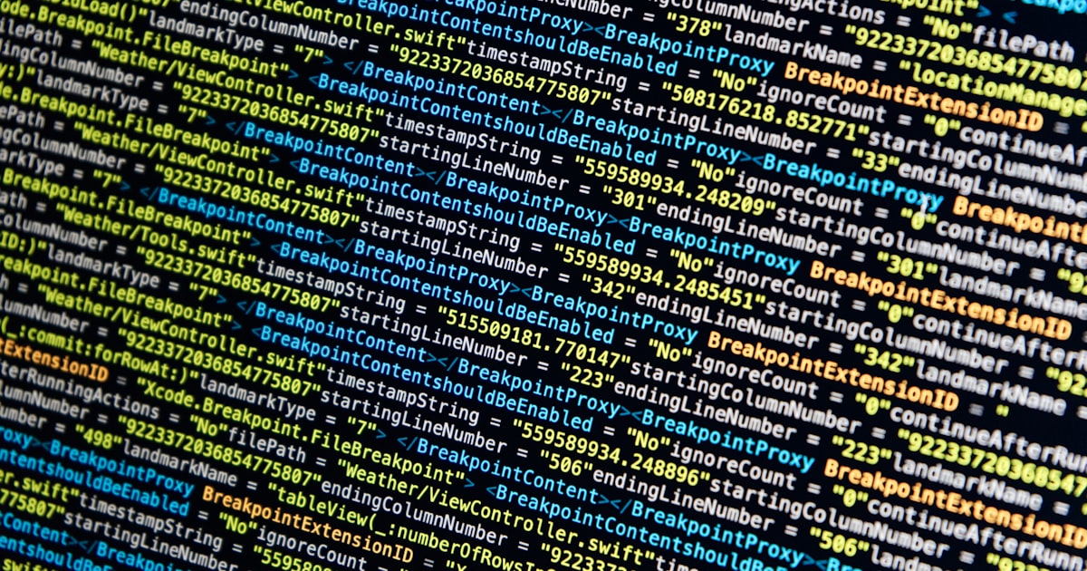 turned-on monitor displays source codes