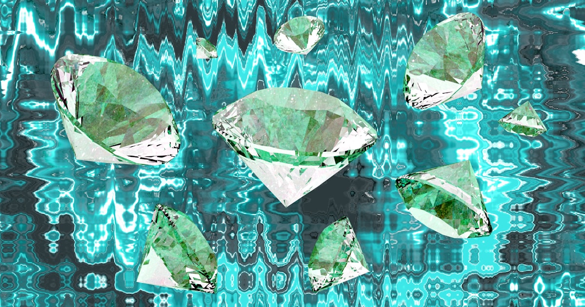 Several large, faceted diamonds on a blue background