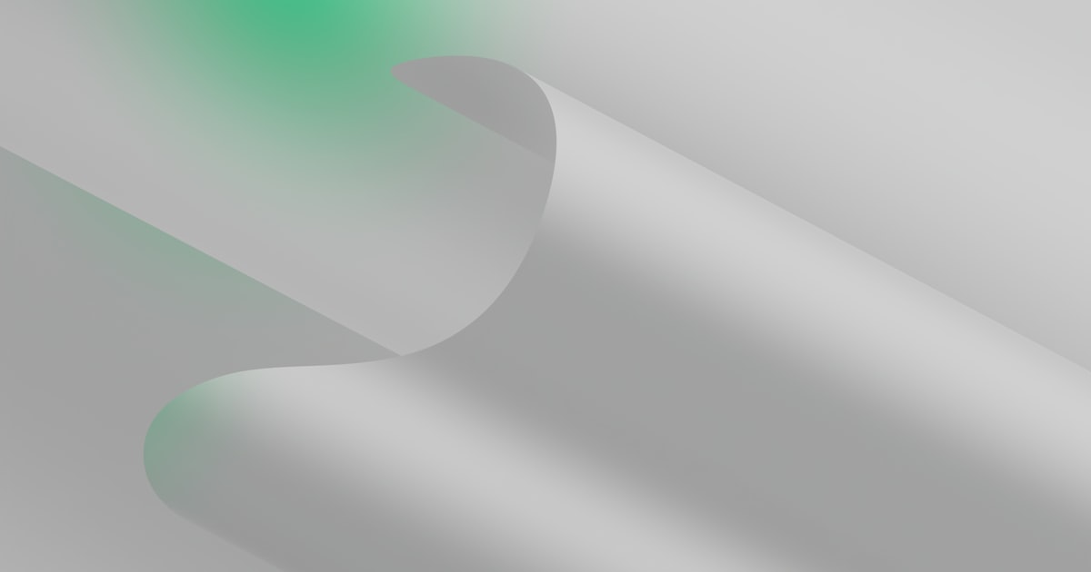 Curled white paper with a green gradient background.