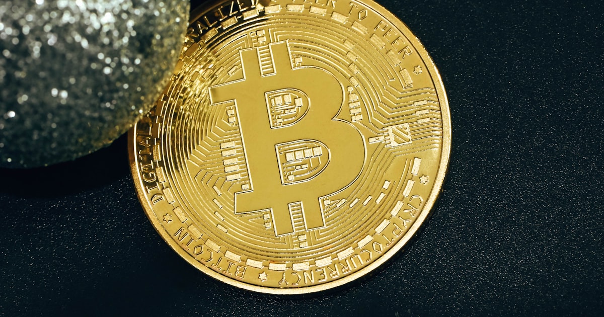 a bit coin sitting on top of a table