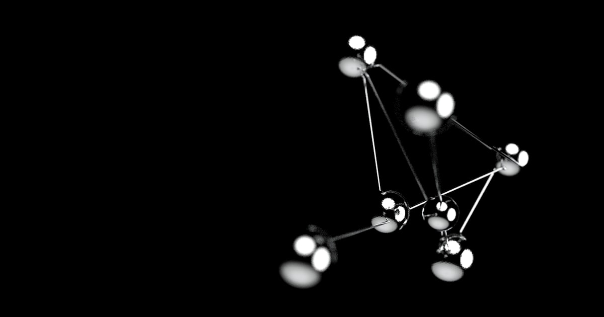 a black and white photo of a cluster of lights
