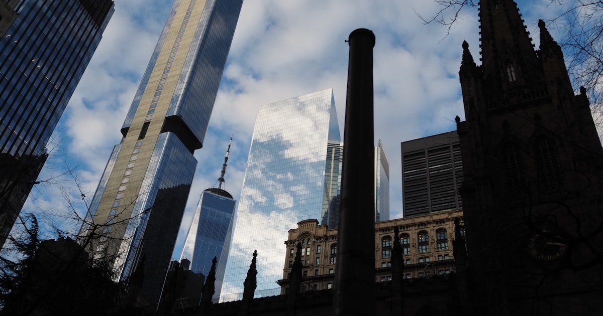 a group of tall buildings sitting next to each other