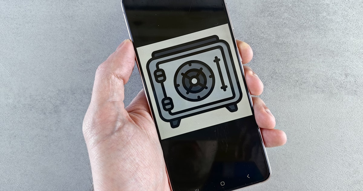 a person holding a cell phone with a camera on it
