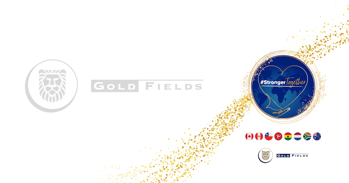 a white background with gold flakes and a blue heart