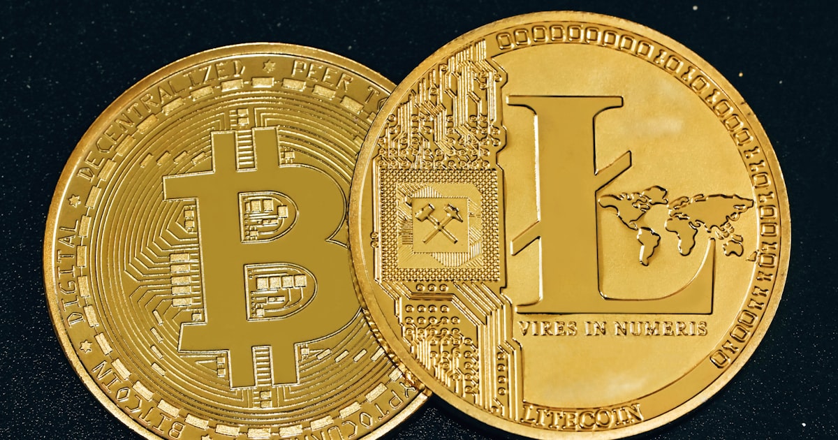 a close up of a gold bit coin