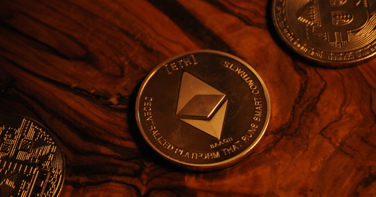 black and silver round coin